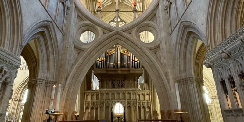 Scissor arch behind altar, Wells Cathedral Photo by JFPenn