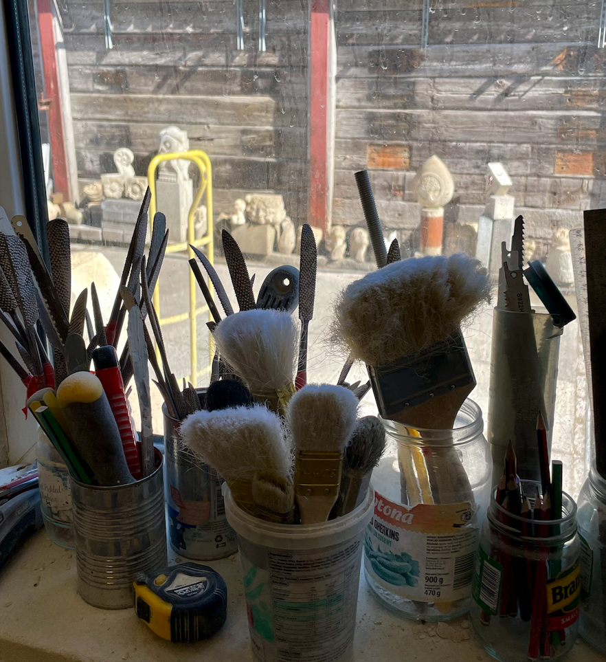 Stone carving tools and examples outside Photo by JFPenn